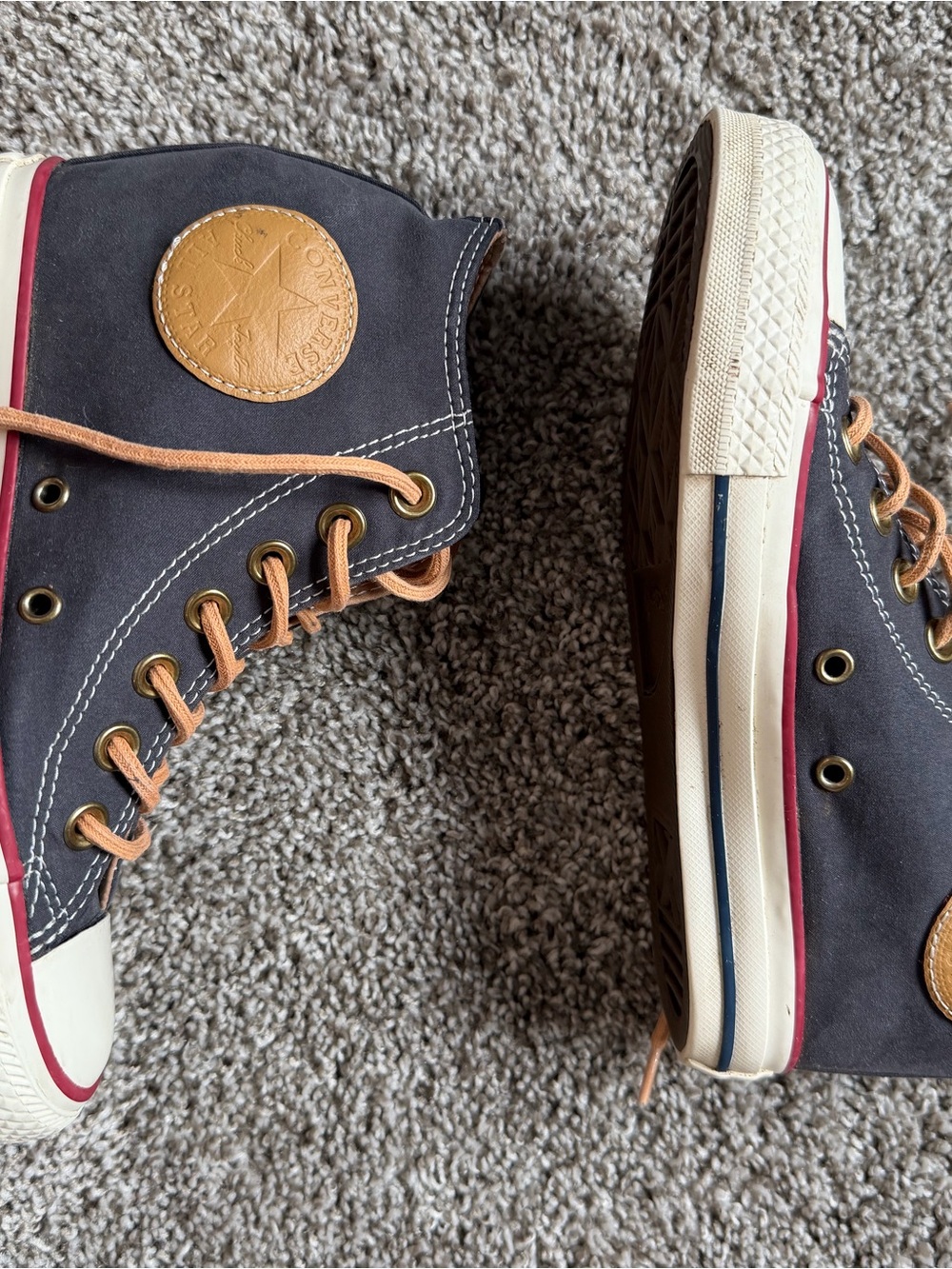Converse women’s High-Top Sneakers in Navy and Tan